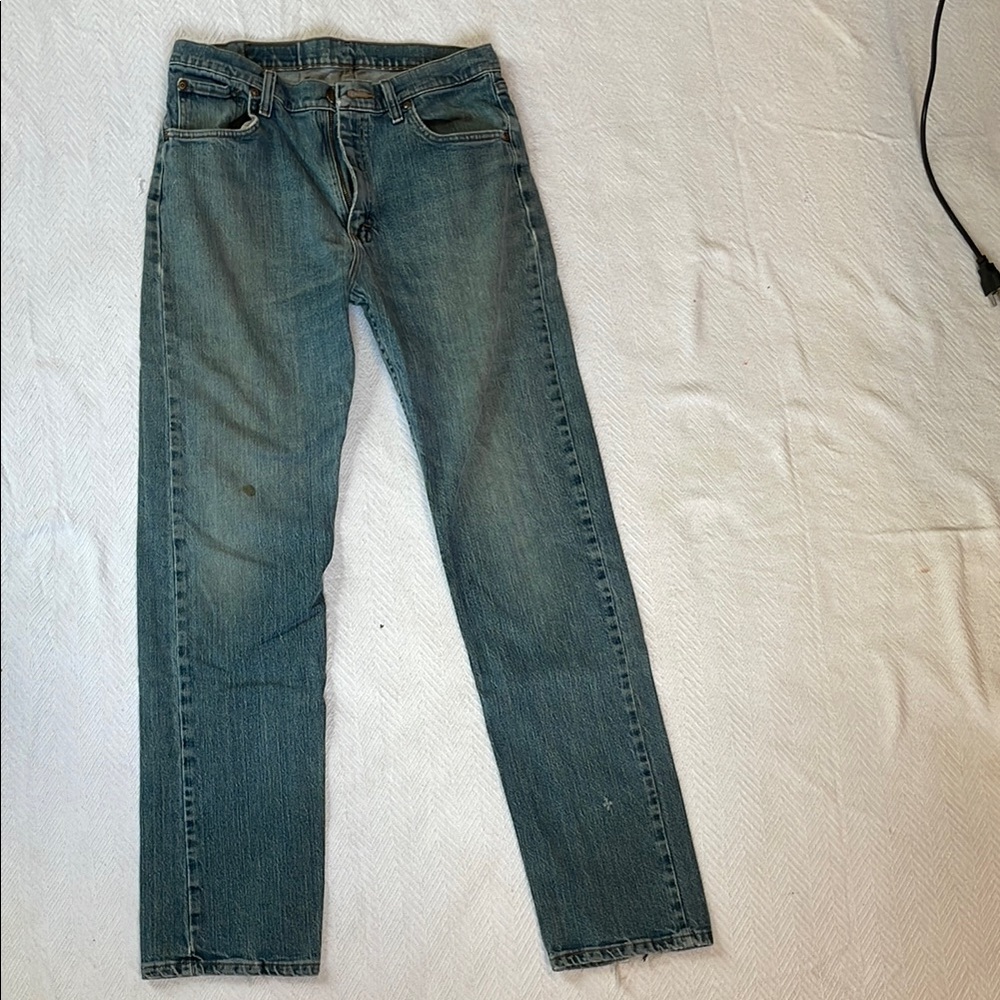 Men's Blue Jeans Wrangler men’s size 32x34. Some flaws, pictured.